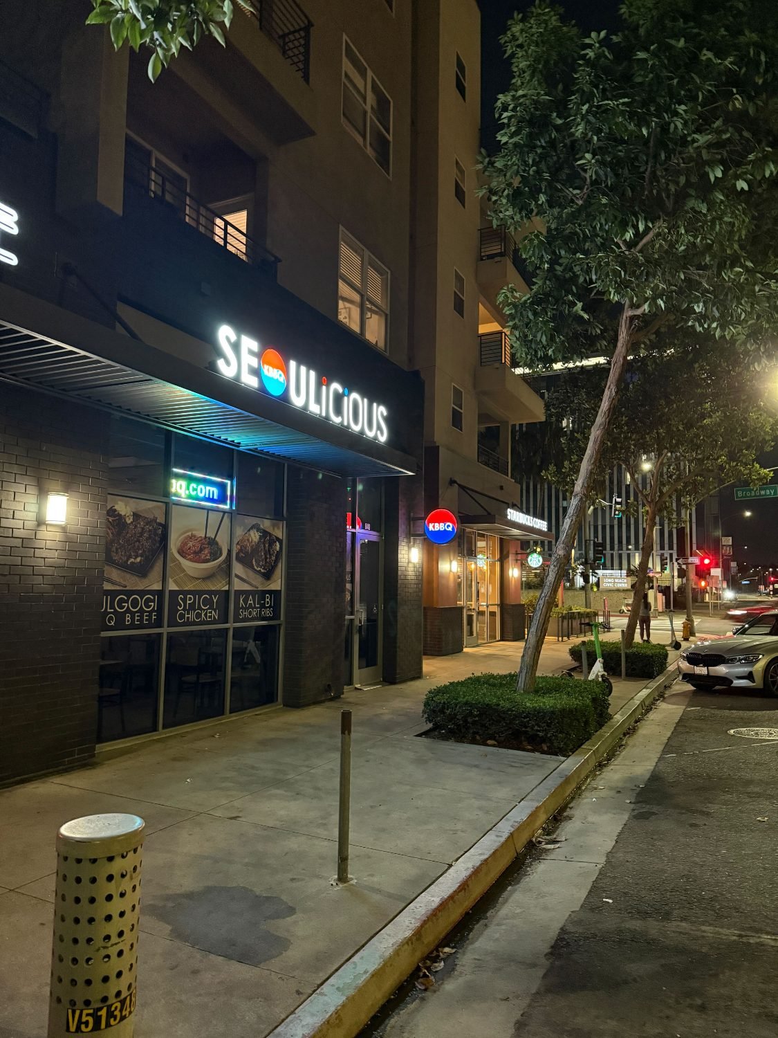 A Korean BBQ restaurant storefront lit at night